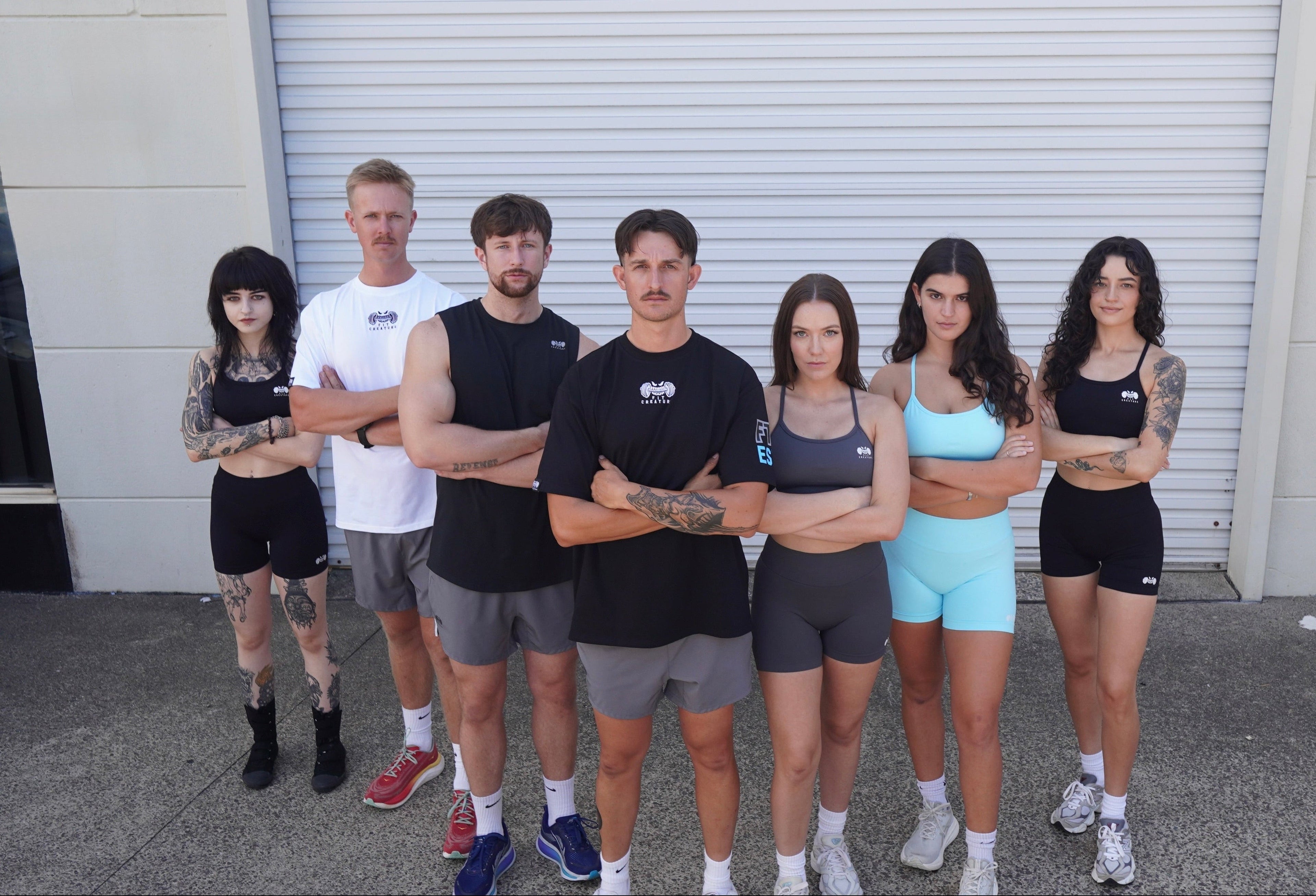 fitcreature family standing together wearing apparel